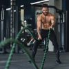 naked-muscular-man-exercising-with-battle-ropes-9G6Q3PV-min.jpg